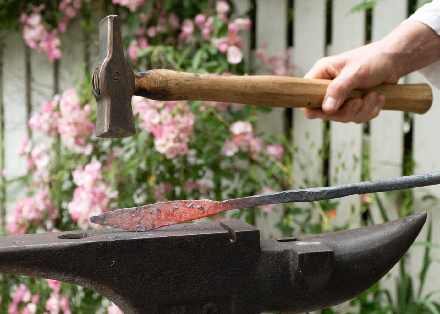 Red hot iron on the forge of Snowhite Blacksmith